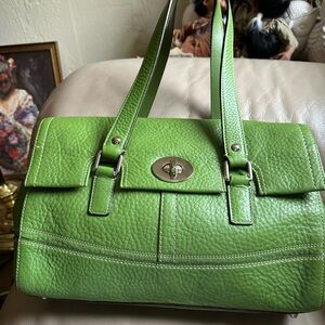 Coach handbag in a beautiful green…like new and great hardware